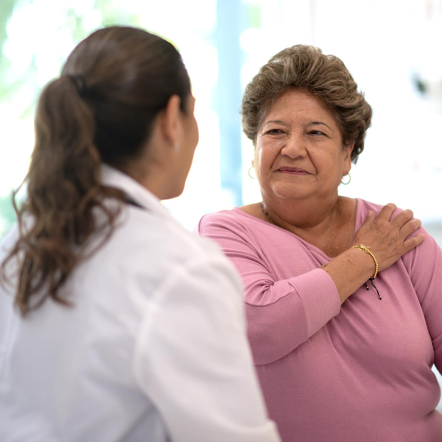 Doctor speaking with patient